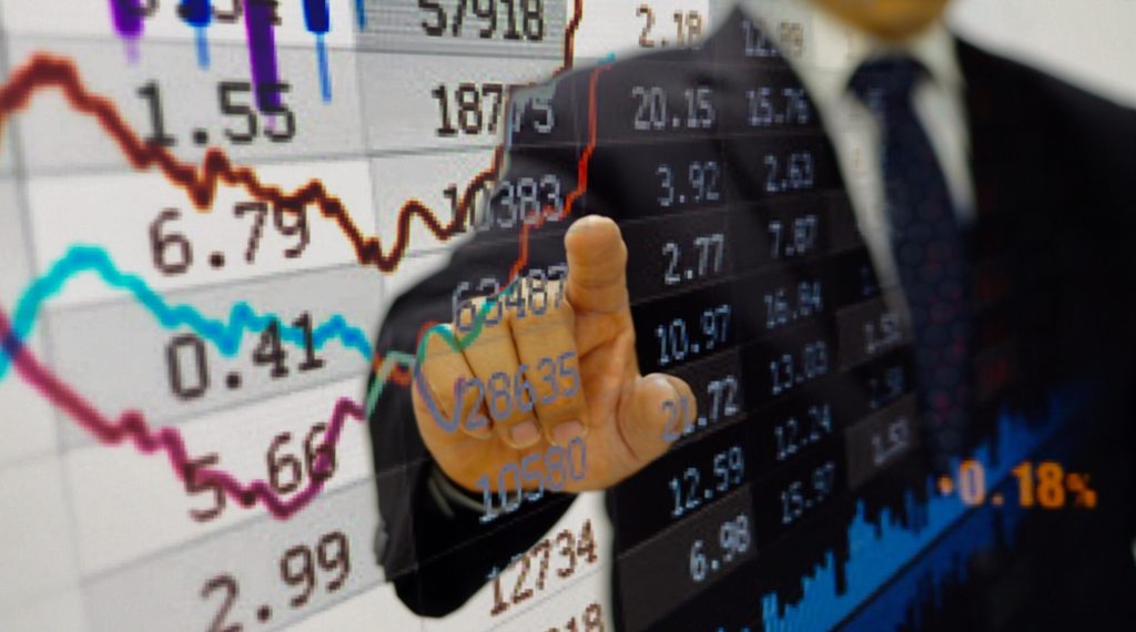 Businessman hand pointing on graph charts of stock on interface screen